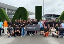 Máximo rendimiento: Logitech y sus partners en el Gran Premio de Miami Grupo de ejecutivos de Logitech y partners posando en el Autódromo Internacional de Miami durante la Fórmula 1.